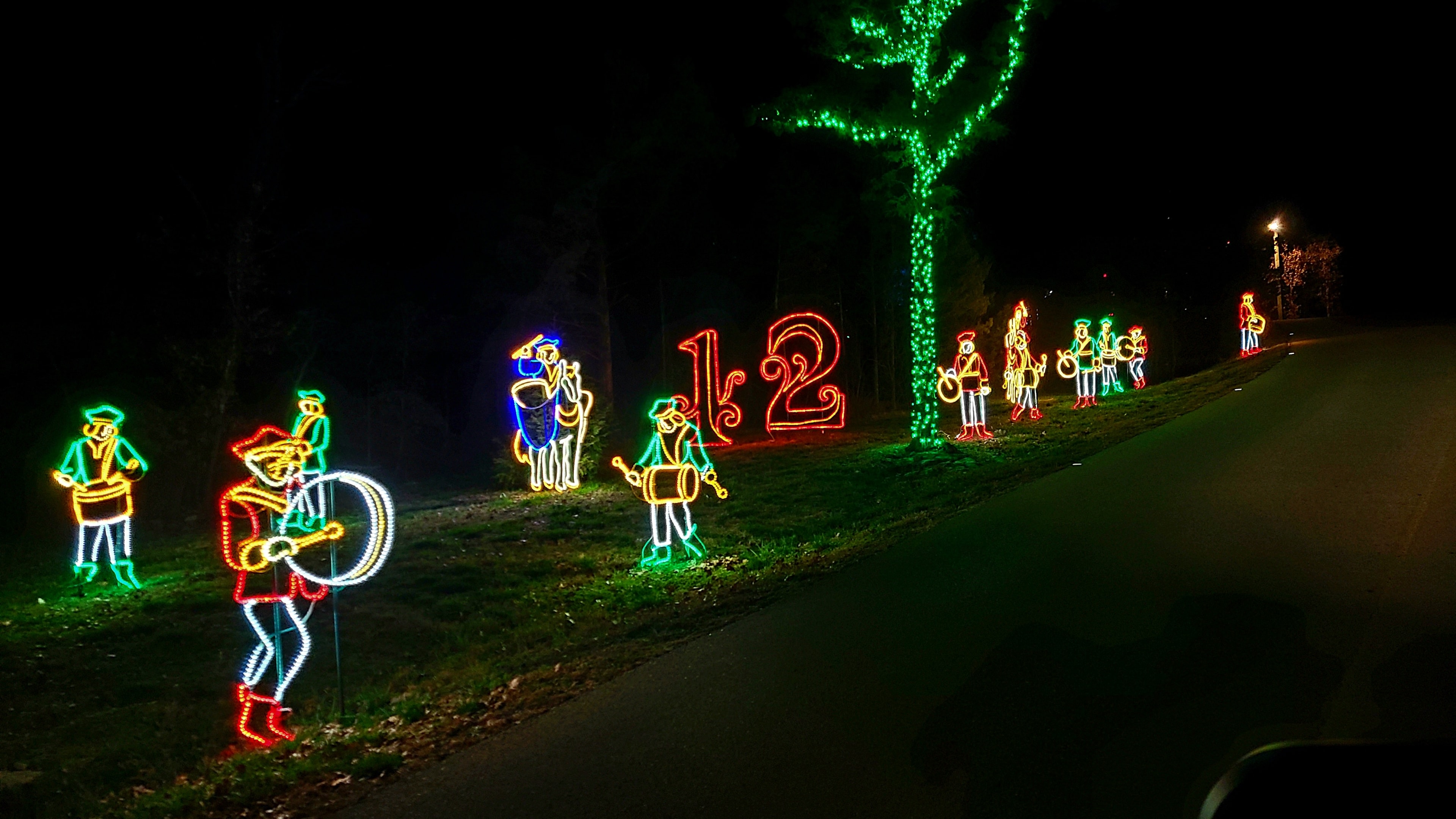 Family enjoying Branson Christmas lights tour